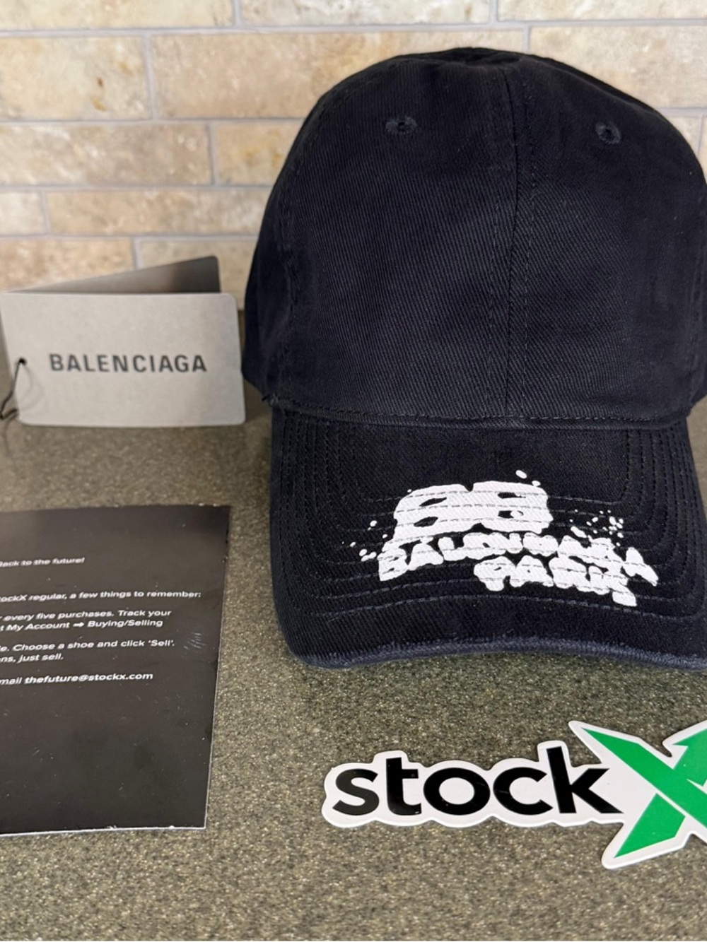 Balenciaga Black Cap with White Graphic Print